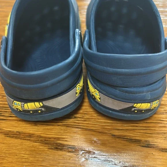 Folhaoth blue rubber open back clogs with yellow excavator on sides.  Toddler 8. - Picture 3 of 10